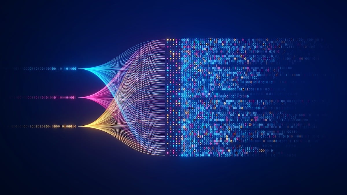 three colored streams of light transforming into computer code